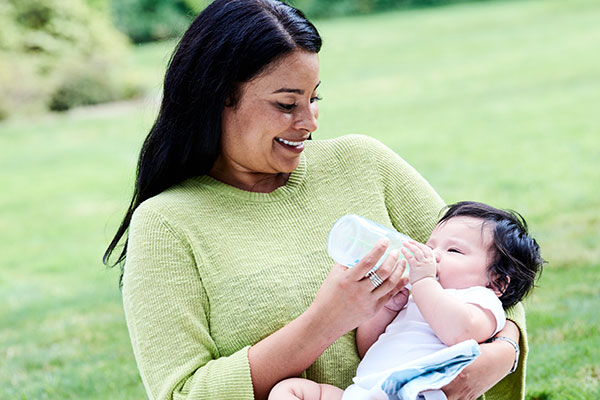 Woman feeding baby