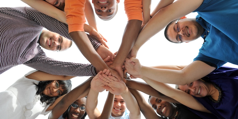 Ten diverse, African American, Asian, caucasian, East Indian, young adults illustrating teamwork.