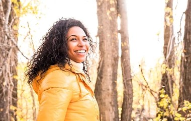 Young woman in autumn woods